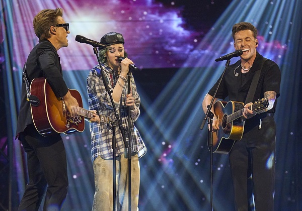 Ava Mannings sings The Reason with coaches Danny Jones and Tom Fletcher in the final of The Voice UK. Picture: ITV Plc