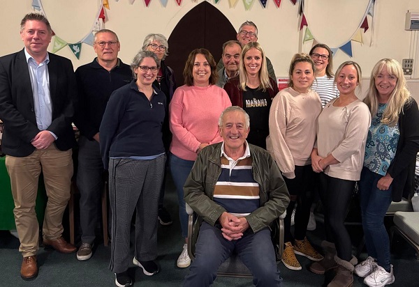 Outgoing chair John Turner (front, centre) with the Winterbourne Down Village Carnival committee.