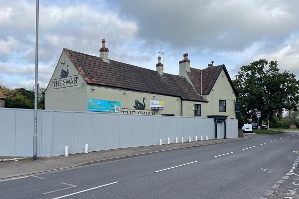 The Swan pub in Winterbourne has been fenced off