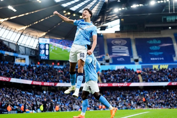 Manchester City's Max Alleyne celebrates scoring the opening goal during the Emirates FA Cup third round match at the Etihad Stadium, Manchester. Picture: PA Images/Alamy